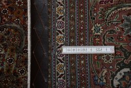 Central medallion detail of New Tabriz rug from Iran / Persia