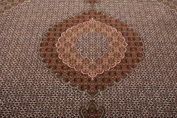 Central medallion detail of New Tabriz rug from Iran / Persia