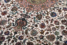 Corner detail of New Tabriz rug showing border pattern and Cork pile