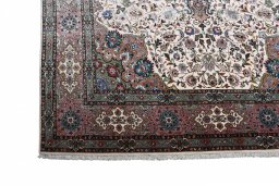 Central medallion detail of New Tabriz rug from Iran / Persia