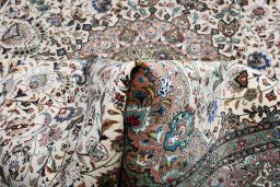 Close-up detail of New Tabriz rug from Iran / Persia showing Cork weave