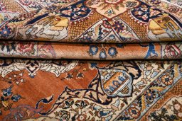 Corner detail of 1930s Tabriz rug showing border pattern and Wool pile