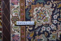 Central medallion detail of New Tabriz rug from Iran / Persia