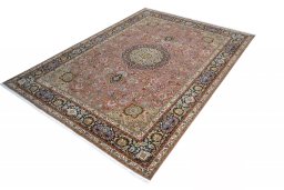 Corner detail of New Tabriz rug showing border pattern and Cork pile