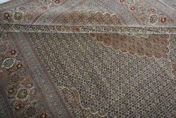 Close-up detail of New Tabriz rug from Iran / Persia showing Cork weave