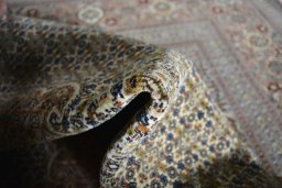 Surface texture of New Tabriz rug with natural Cork and intricate pattern