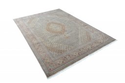 Close-up detail of New Tabriz rug from Iran / Persia showing Cork weave