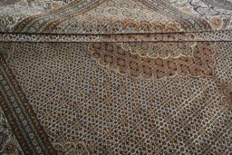 Close-up detail of 2000s Tabriz rug from Iran / Persia showing Cork weave
