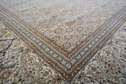 Close-up detail of 2000s Tabriz rug from Iran / Persia showing Cork weave