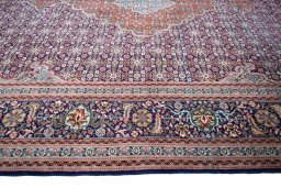 Corner detail of New Tabriz rug showing border pattern and Cork pile