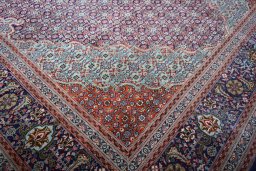 Close-up detail of New Tabriz rug from Iran / Persia showing Cork weave