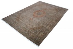 Corner detail of New Tabriz rug showing border pattern and Cork pile