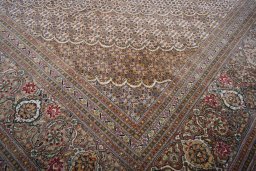Close-up detail of New Tabriz rug from Iran / Persia showing Cork weave