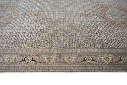 Corner detail of Unknown Tabriz rug showing border pattern and Wool pile