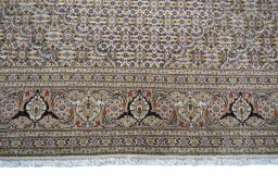 Full view of Unknown Tabriz rug from Iran / Persia, 337 × 143 cm in Beige tones