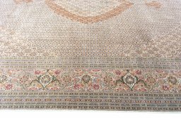Close-up detail of 2000s Tabriz rug from Iran / Persia showing Cork weave
