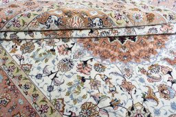 Corner detail of New Tabriz rug showing border pattern and Cork pile