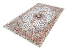 Corner detail of New Tabriz rug showing border pattern and Cork pile
