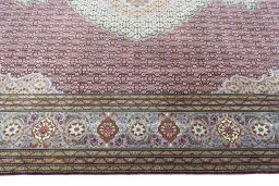 Corner detail of New Tabriz rug showing border pattern and Cork pile