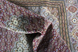Surface texture of New Tabriz rug with natural Cork and intricate pattern