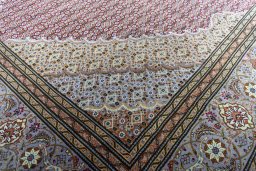 Close-up detail of New Tabriz rug from Iran / Persia showing Cork weave