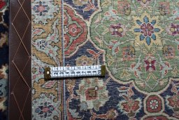 Central medallion detail of 1970s Tabriz rug from Iran / Persia