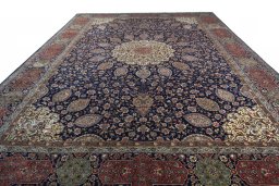 Surface texture of 1970s Tabriz rug with natural Wool and intricate pattern