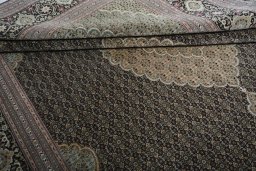 Close-up detail of New Tabriz rug from Iran / Persia showing Cork weave