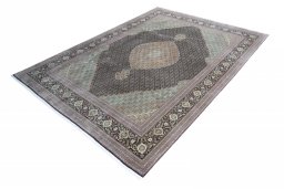Corner detail of New Tabriz rug showing border pattern and Cork pile