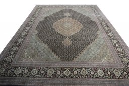 Surface texture of New Tabriz rug with natural Cork and intricate pattern