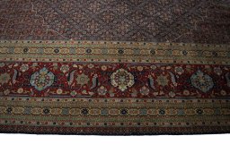 Close-up detail of 1930s Tabriz rug from Iran / Persia showing Wool weave