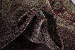 Backside of handmade 1930s Tabriz rug showing knot structure and weave density