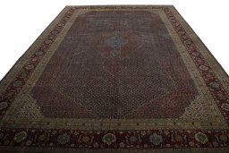 Surface texture of 1930s Tabriz rug with natural Wool and intricate pattern