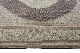 Corner detail of New Tabriz rug showing border pattern and Cork pile
