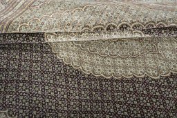 Close-up detail of New Tabriz rug from Iran / Persia showing Cork weave