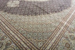 Close-up detail of New Tabriz rug from Iran / Persia showing Cork weave