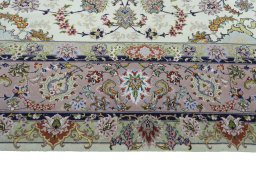 Corner detail of New Tabriz rug showing border pattern and Cork pile