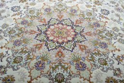 Central medallion detail of New Tabriz rug from Iran / Persia