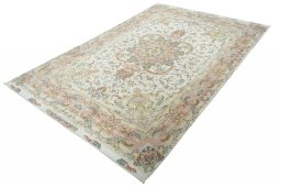 Corner detail of New Tabriz rug showing border pattern and Cork pile