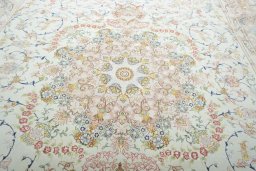 Central medallion detail of New Tabriz rug from Iran / Persia