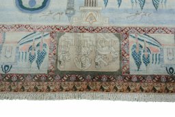 Corner detail of 1930s Tabriz rug showing border pattern and Wool pile