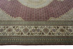 Corner detail of New Tabriz rug showing border pattern and Cork pile