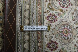Backside of handmade New Tabriz rug showing knot structure and weave density