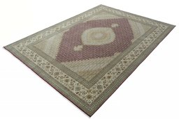 Corner detail of New Tabriz rug showing border pattern and Cork pile