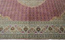Corner detail of New Tabriz rug showing border pattern and Cork pile