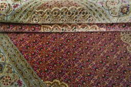 Close-up detail of New Tabriz rug from Iran / Persia showing Cork weave