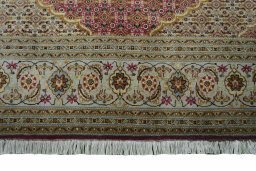 Full view of New Tabriz rug from Iran / Persia, 195 × 150 cm in Red tones