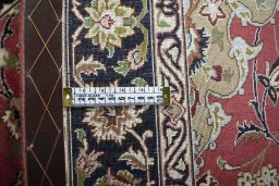 Central medallion detail of New Tabriz rug from Iran / Persia