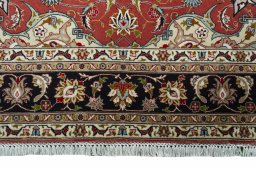 Corner detail of New Tabriz rug showing border pattern and Cork pile
