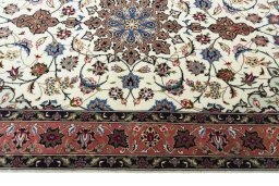 Corner detail of New Tabriz rug showing border pattern and Cork pile